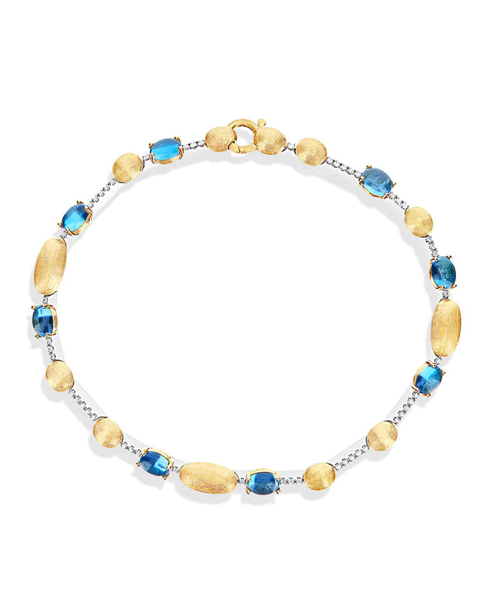 "AZURE" GOLD, DIAMONDS AND LONDON BLUE TOPAZ TENNIS BRACELET